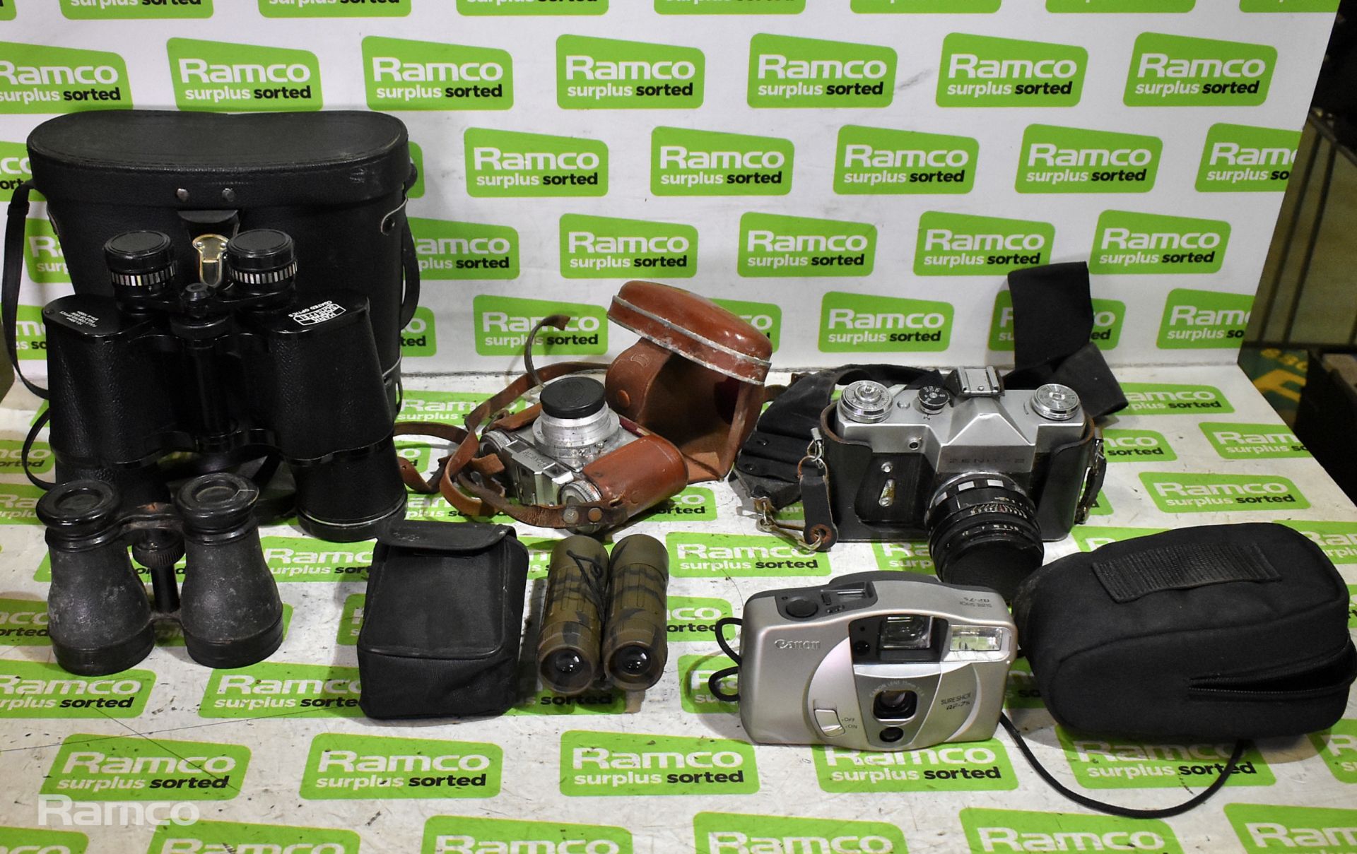 3x Pairs of binoculars and 3x cameras with and without cases
