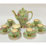 An Empire English 1930s Chinzware fifteen piece coffee set complete with baluster form coffee pot (