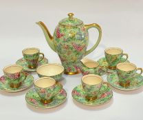 An Empire English 1930s Chinzware fifteen piece coffee set complete with baluster form coffee pot (