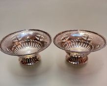 A pair of Birmingham silver bead rim pierced bon bon dishes on circular pierced bases, (5cm x