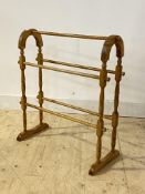 A turned beech towel rail, H77cm