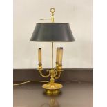 A quality Georgian style cast brass bouillette table light, the adjustable conical tin shade over
