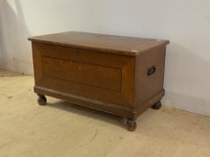 A 19th century scumbled pine blanket box, the hinged lid enclosing two drawers and candle tray to