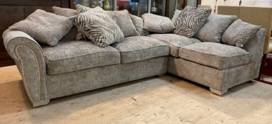 A contemporary crushed grey velvet upholstered corner sofa with squab and scatter cushions, H74cm,