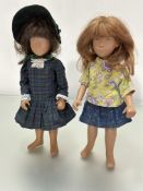 A limited edition Sasha doll 1981 number 3982 with natural brown hair dressed in tartan dress with