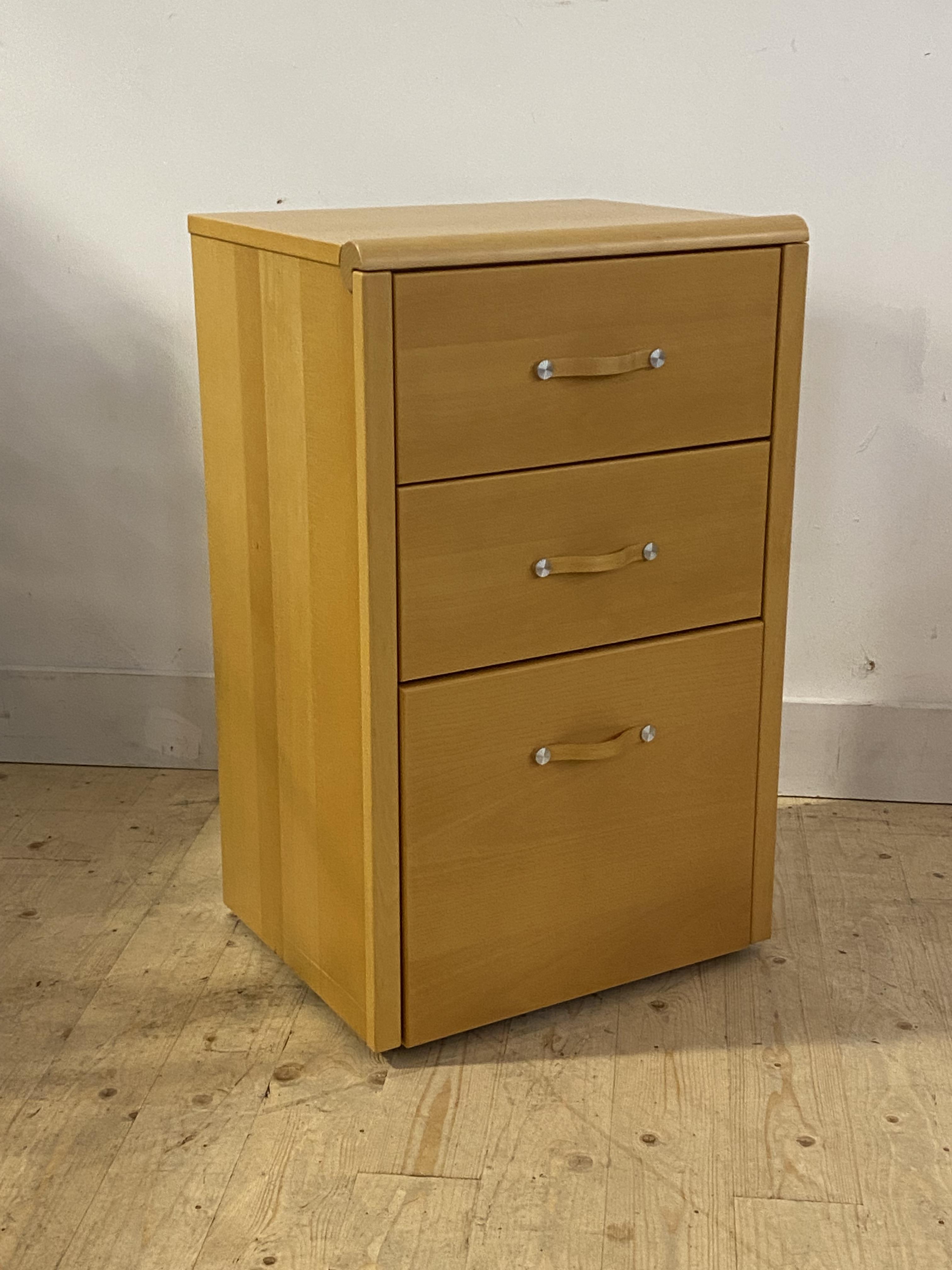 Hulsta, A German light beech veneered chest fitted with three drawers, H81cm, W50cm, D40cm