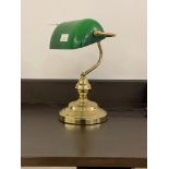 A gilt brass bankers style light with green glass shade H37cm