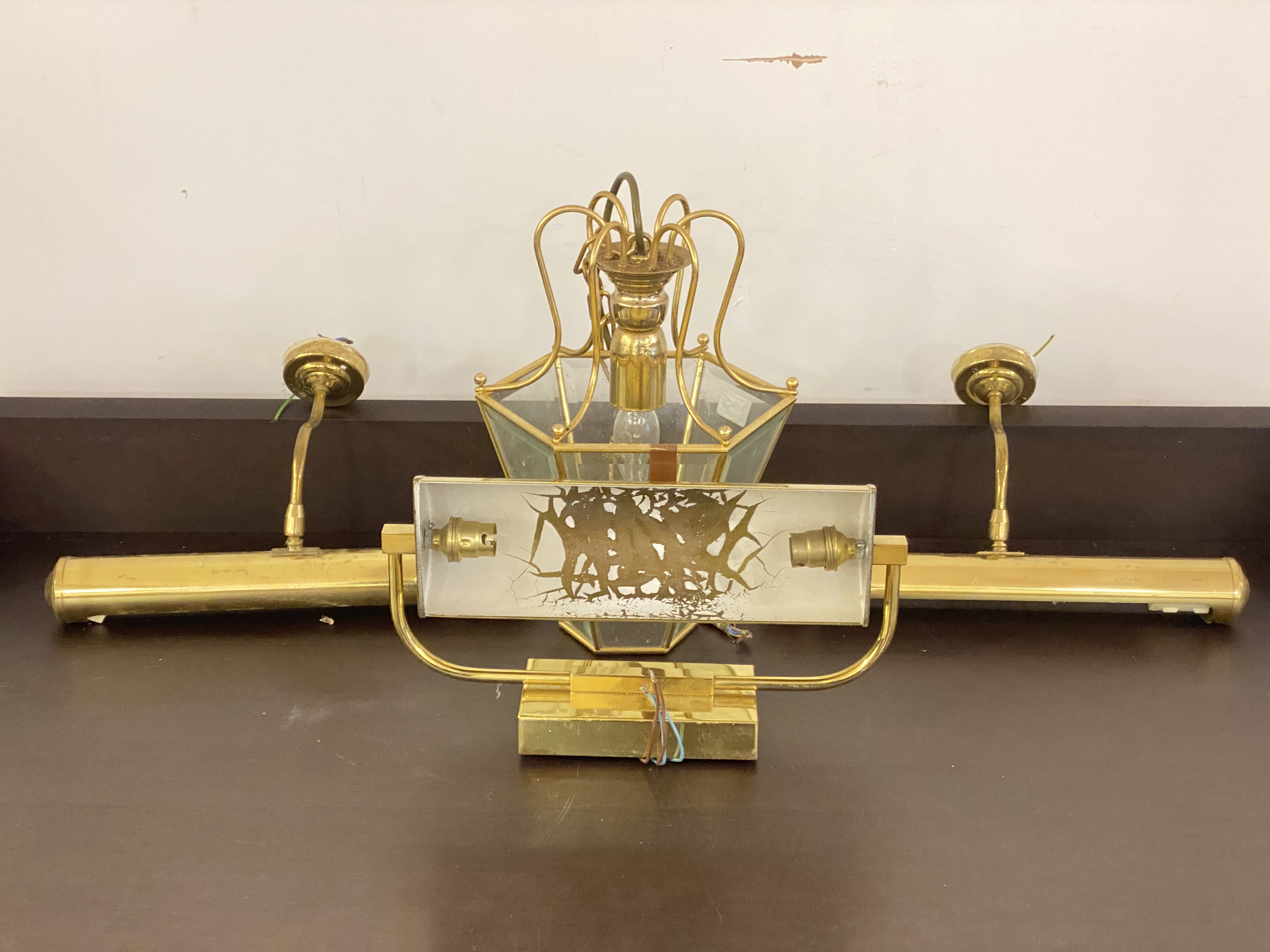A gilt brass hall lantern of tapered hexagonal form, with inset bevelled glass panels, (H34cm)