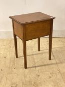 An early 20th century oak sewing table with silk lined interior, H54cm