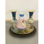 A mixed lot to include; a pair of vases with flared rims, another ceramic vase, a moulded glass bowl