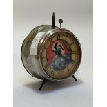 A German Nurnburg souvenir alarm clock, circular steel case with paper face depicting Adolf