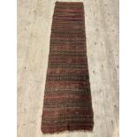 An old Caucasian flat weave runner rug of lineal design, 225cm x 57cm