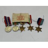 WWII medal group, 1939-45 Star, Africa, Italy, Defence and War Medal (unnamed) together with Army
