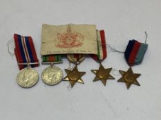 WWII medal group, 1939-45 Star, Africa, Italy, Defence and War Medal (unnamed) together with Army