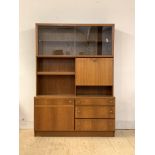 McIntosh, A mid century teak side cabinet, the top section fitted with twin smoked glass sliding