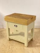 A modern butchers block type side table, the top with lift out chopping board over frieze drawer and