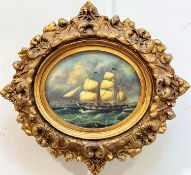 A reproduction oval panel of an English naval three masted ship, on a stormy sea, oil on panel, gilt