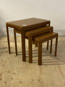 A mid century teak nest of three tables, H48cm, W56cm, D38cm