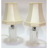 A pair of crystal slice cut cylinder table lamp bases with chrome mounts, (25 x 10, with shades h: