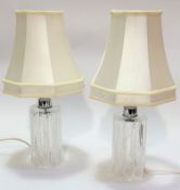 A pair of crystal slice cut cylinder table lamp bases with chrome mounts, (25 x 10, with shades h: