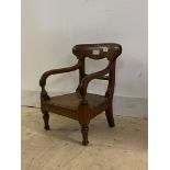 A Victorian stained pine Edinburgh pattern child's elbow chair, H49cm, W37cm