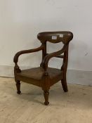 A Victorian stained pine Edinburgh pattern child's elbow chair, H49cm, W37cm