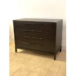 A contemporary stained oak veneered chest, fitted with four drawers, raised on square section