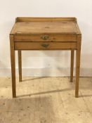 A Victorian pine clerks desk, the galleried top over writing slant lifting to reveal fitted