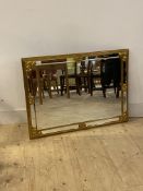 A contemporary gilt framed wall hanging mirror with sectional bevelled plates, 70cm x 95cm