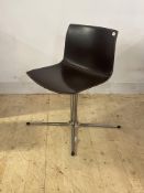 A contemporary desk chair, the leather seat raised on a chrome four point base, H80cm, W56cm, D48cm