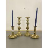 A pair of Victorian brass knop stem brass candle sticks, together with a pair of brass 19th