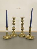 A pair of Victorian brass knop stem brass candle sticks, together with a pair of brass 19th