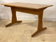 An Arts and Crafts style varnished beech trestle end dining table, H81cm, 153cm x 85cm