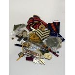 Mixed lot of modern cloth and staybright cap badges, two stable belts etc.