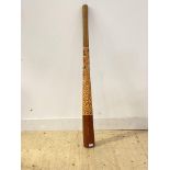 An Aboriginal style Digeridoo with stylised decoration, L133cm