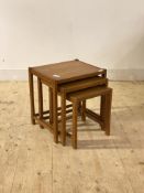 A mid century oak nest of three tables, H48cm, W46cm, D38cm