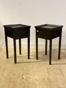 A pair of contemporary tray top bedside tables, each fitted with two drawers, raised on square