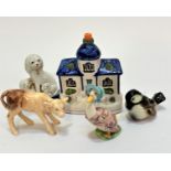 A Sylvac model, a Staffordshire figure group of a spaniel and puppies, (h :12) a Victorian pottery