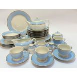 A Doulton china blue and gilt bordered part breakfast set of thirty four pieces, including breakfast