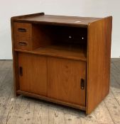 A mid century teak record cabinet, with two drawers, open shelf, twin sliding doors under