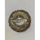 Queen's Own Cameron Highlanders piper plaid brooch, cast metal (7cm)