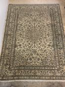 A fine hand knotted carpet from the kashan region, the ivory field with medallion, spandrels and