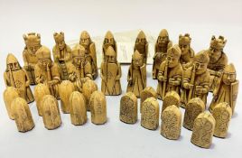 A cast composition set of Uig Isle of Lewis chess and draughtsmen complete with related