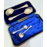 A pair of Victorian Sheffield silver engraved spoons, 1897, complete with original fitted case and a