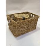 A wicker basket of rectangular form with carry handle to each side together with a wicker lidded