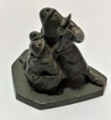 A cast metal group of three firemen with hose, unsigned, on shaped base, (16 x 17 x 11), a section