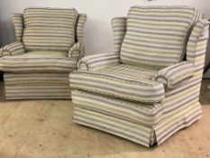 A pair of contemporary wing back easy chairs, upholstered in blue and green striped natural