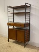 Staples Ladderax, a mid century teak modular wall unit, with two adjustable shelves over drawer