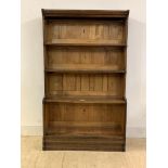 An Early 20th century Globe Wernicke style oak four height stacking open bookcase, with ivorine