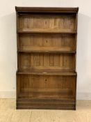 An Early 20th century Globe Wernicke style oak four height stacking open bookcase, with ivorine